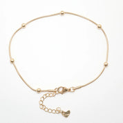 Pulsera de tobillo de acero dorado