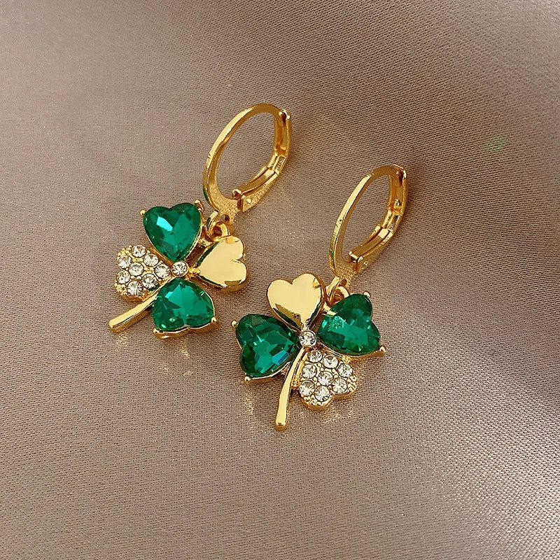 Pendientes colgantes de trébol ligeros de lujo para mujer, aretes elegantes de Metal de cristal de circón brillante, joyería fina de moda 2024